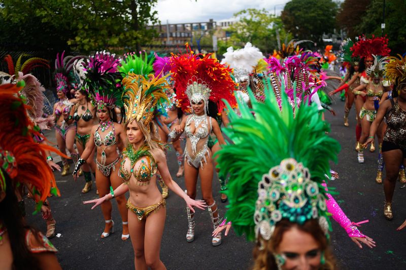 \u200bSamba dancers prepare before the start of the Notting Hill Carniva