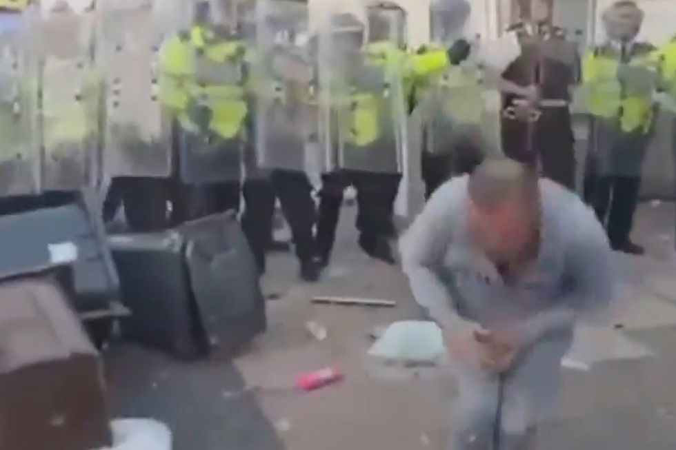\u200bScreenshot of the moment Spencer was hit in groin by a brick