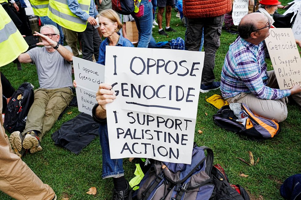 \u200bSigns were held up at the rally