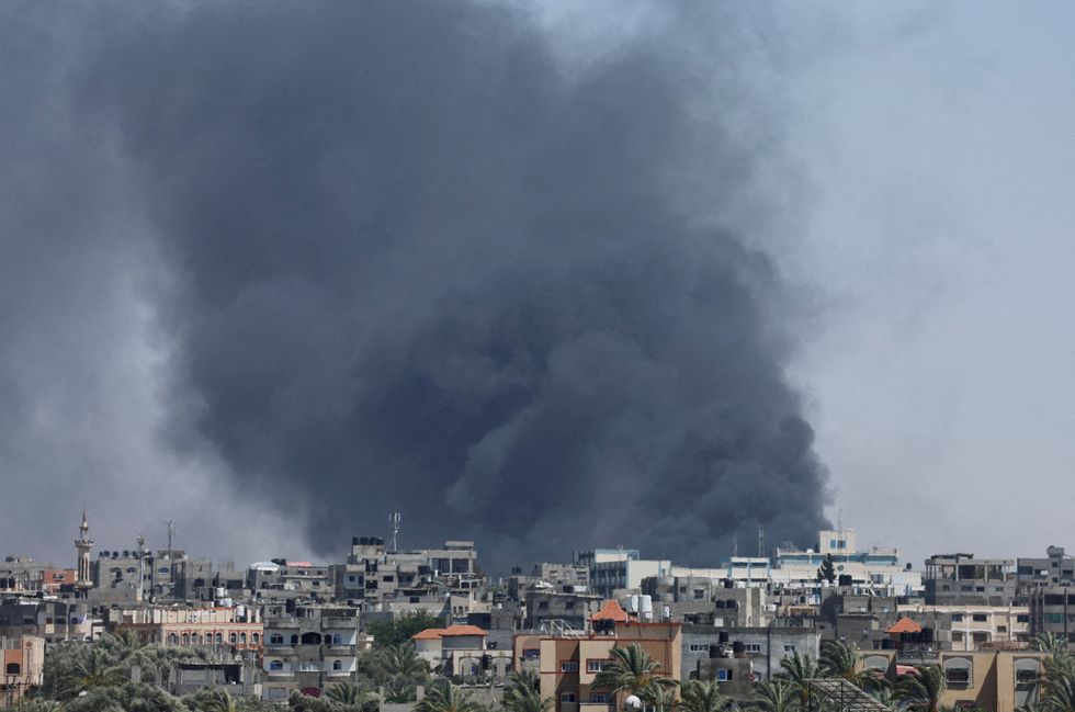 \u200bSmoke rises during an Israeli