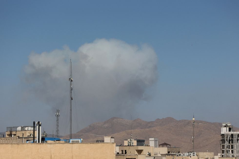 \u200bSmoke rises following an Israeli attack in Tehran, Iran,