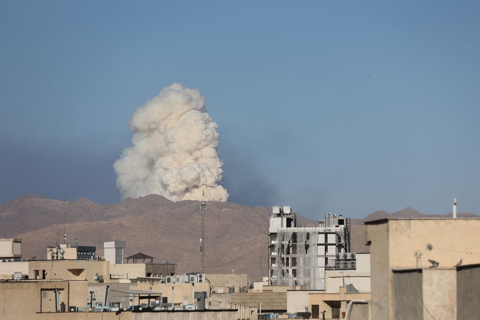 \u200bSmoke rises following an Israeli attack in Tehran, Iran