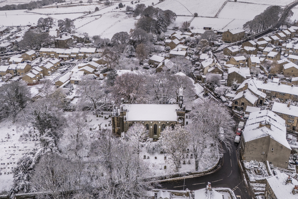 \u200bSnow surrounds All Saints Netherthong Church in Holmfirth west Yorkshire.