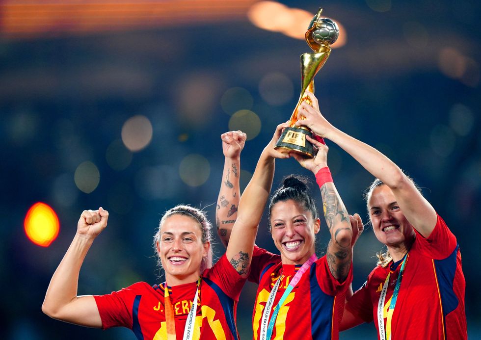 \u200bSpain's Alexia Putellas, Jennifer Hermoso, and Irene Paredes celebrating world cup win