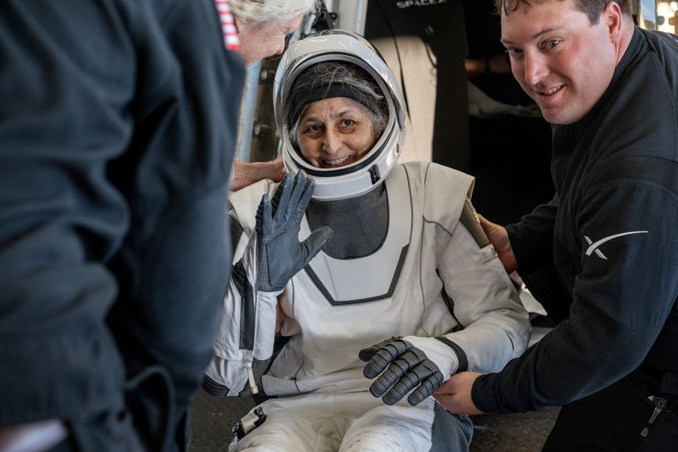\u200bSuni Williams is helped out of a SpaceX Dragon spacecraft onboard the SpaceX recovery ship