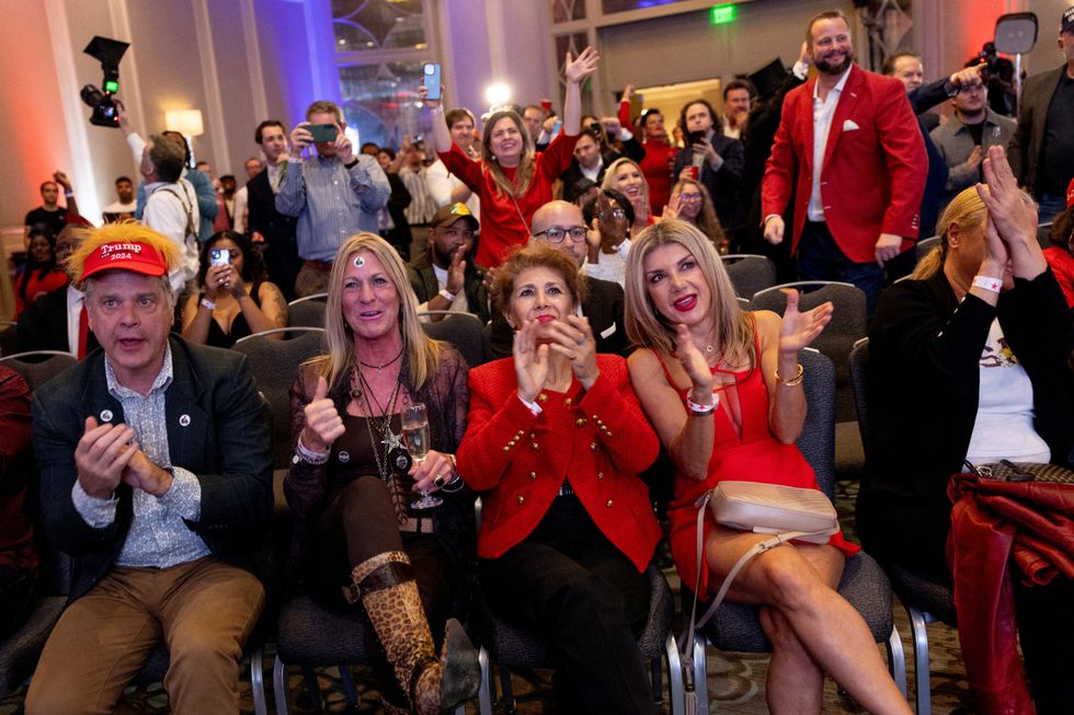 \u200bSupporters of Donald Trump react as they watch early election results in Georgia