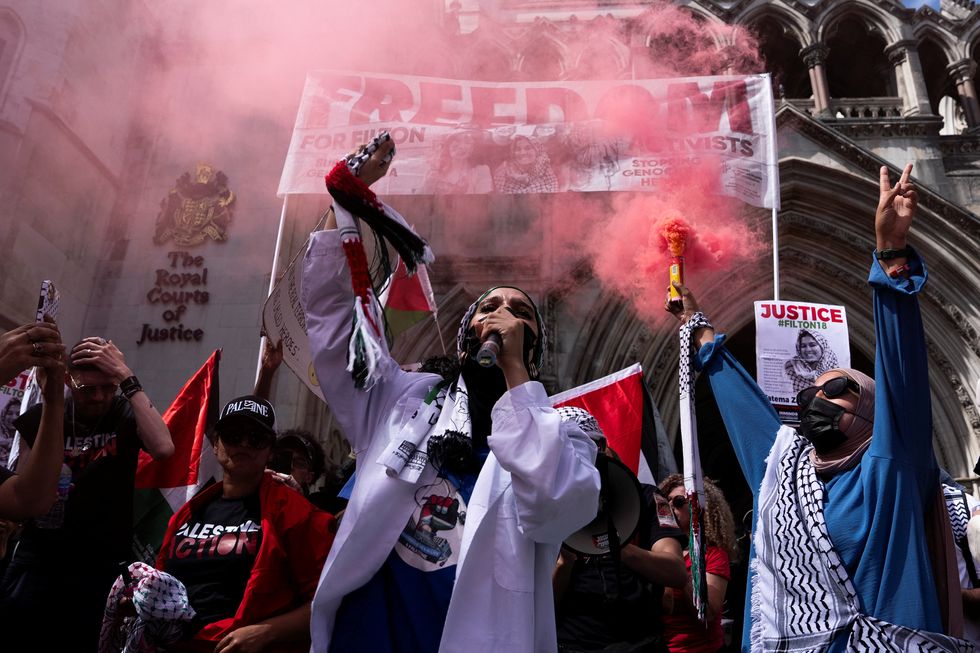 \u200bSupporters of pro-Palestinian campaign organisation Palestine Action demonstrate outside London's High Court