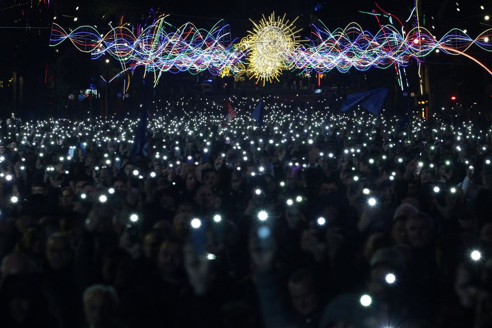 \u200bSupporters of the opposition attend an anti-government protest, in Tirana