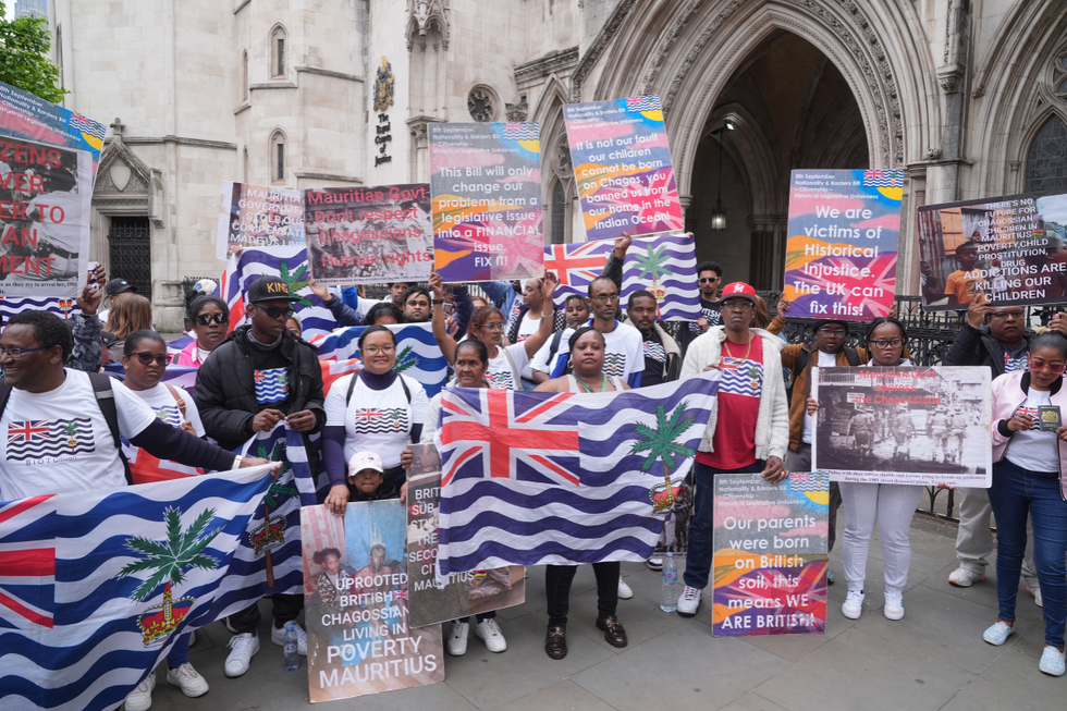 \u200bSupporters outside the High Court in central London, during a hearing over a last-minute block on the Government from concluding its deal on the Chagos Islands