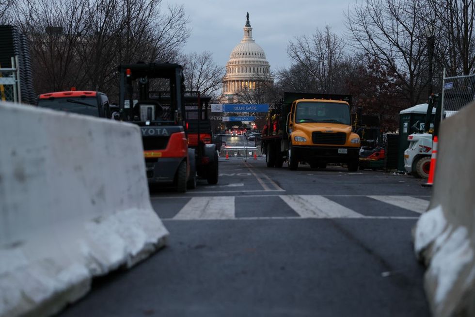 \u200bTemporary barricades are placed in front of the US Capitol