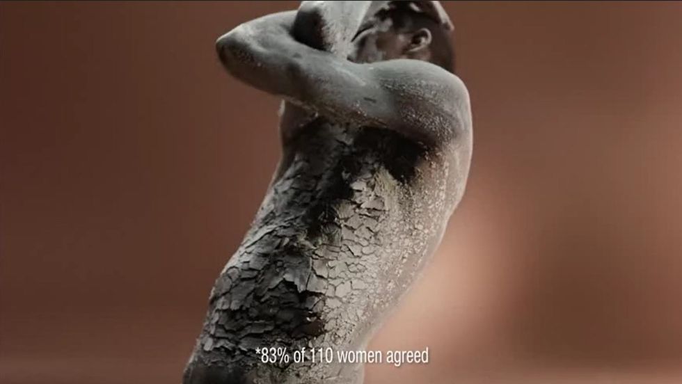 \u200bThe advert showed a black model with cracked skin