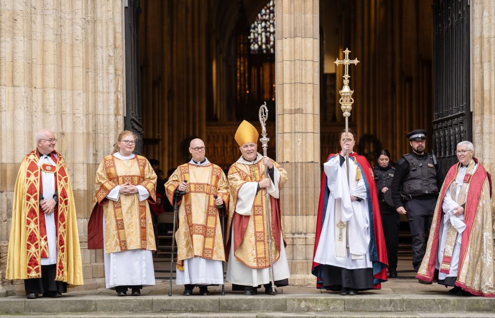 \u200bThe Archbishop of York Stephen Cottrell (centre) following the Christmas Day Festal Eucharist service at York Minster