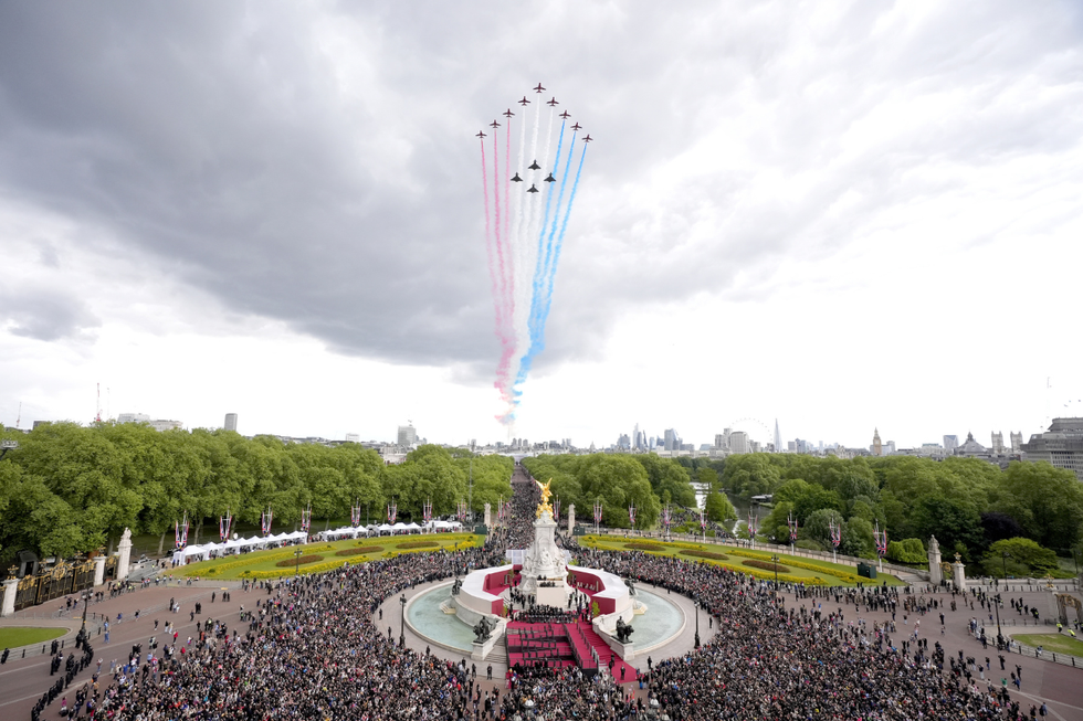 \u200bThe military fly past passes over The Mall and Buckingham Palace