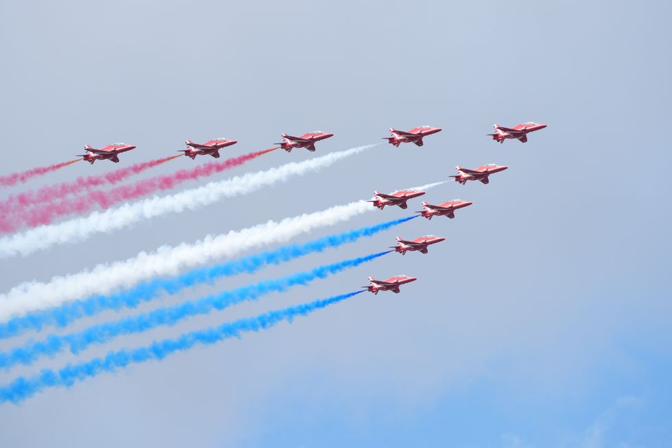 \u200bThe Red Arrows display team perform a fly past over the Farnborough International Airshow
