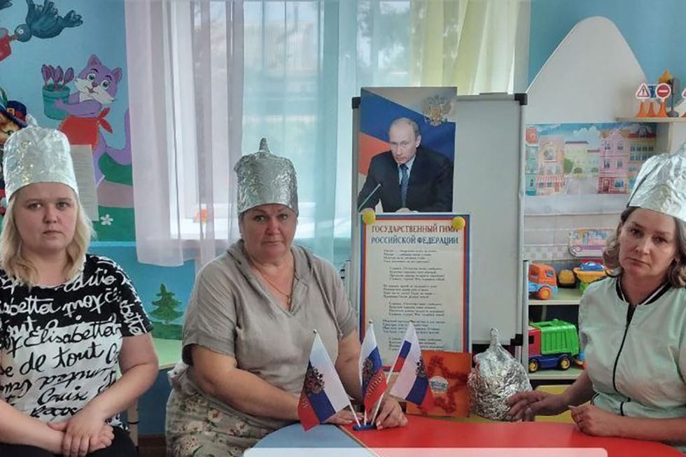 \u200bThe Russian teachers wearing their hats
