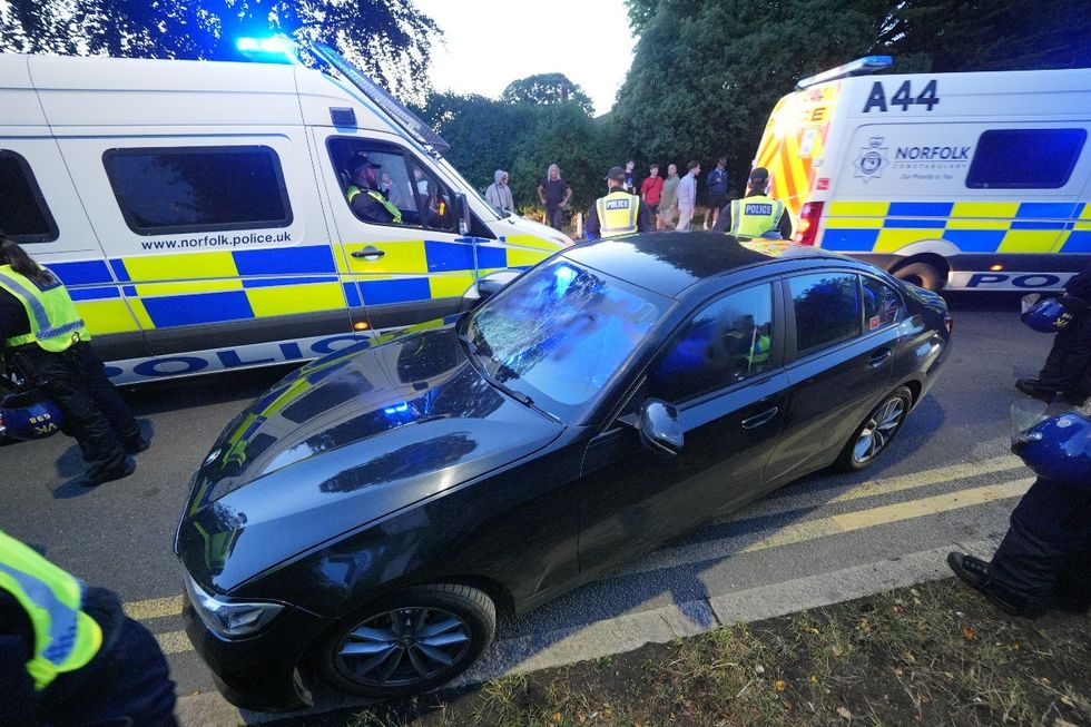 \u200bThe shattered windscreen of a police car