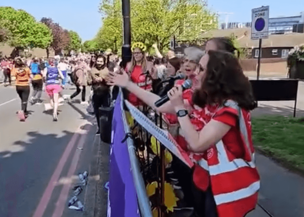 u200bThe Singing Striders performing at last year's London marathon for Scope