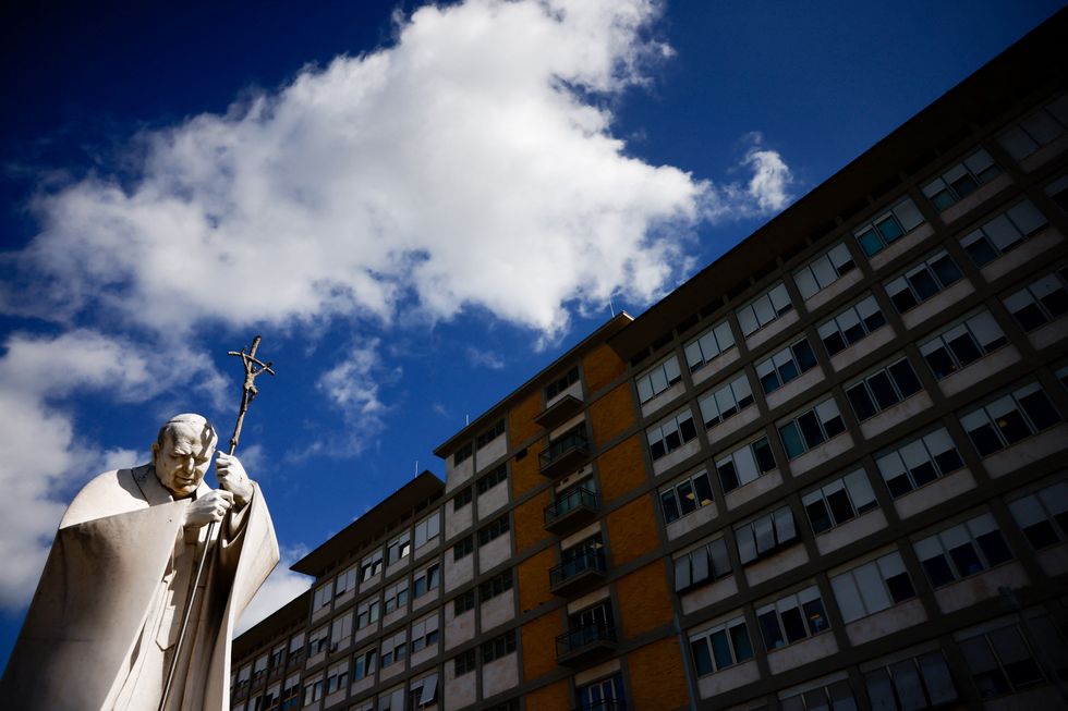 \u200bThe statue of late Pope John Paul II is seen, outside Gemelli Hospital