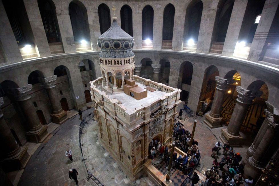 \u200bThe tomb of Jesus Christ with the rotunda is seen in the Church of the Holy Sepulchre