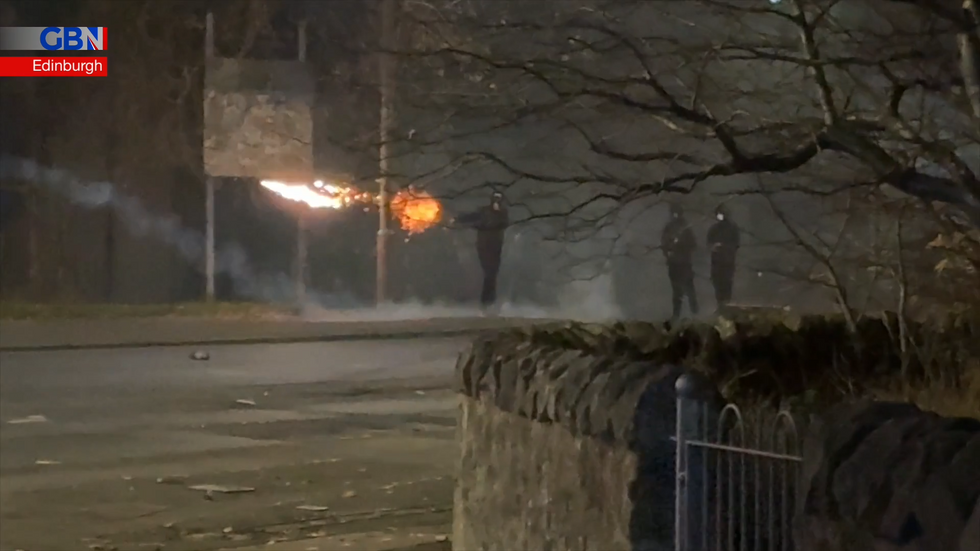 \u200bThugs launched Roman candles at police