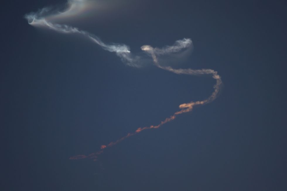 \u200bTrace of an Iranian missile is seen in the sky in Tehran, Iran
