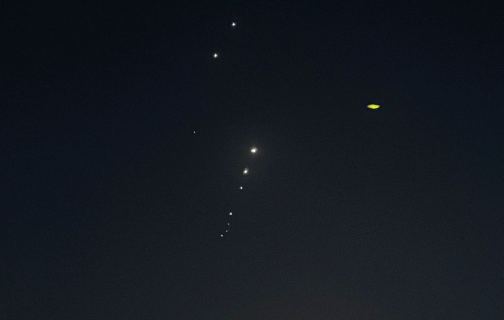 \u200bTraces are seen in the sky after Iran's armed forces say they targeted The Al-Udeid base in a missile attack