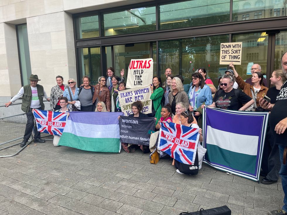 \u200bTrans activists outside the court