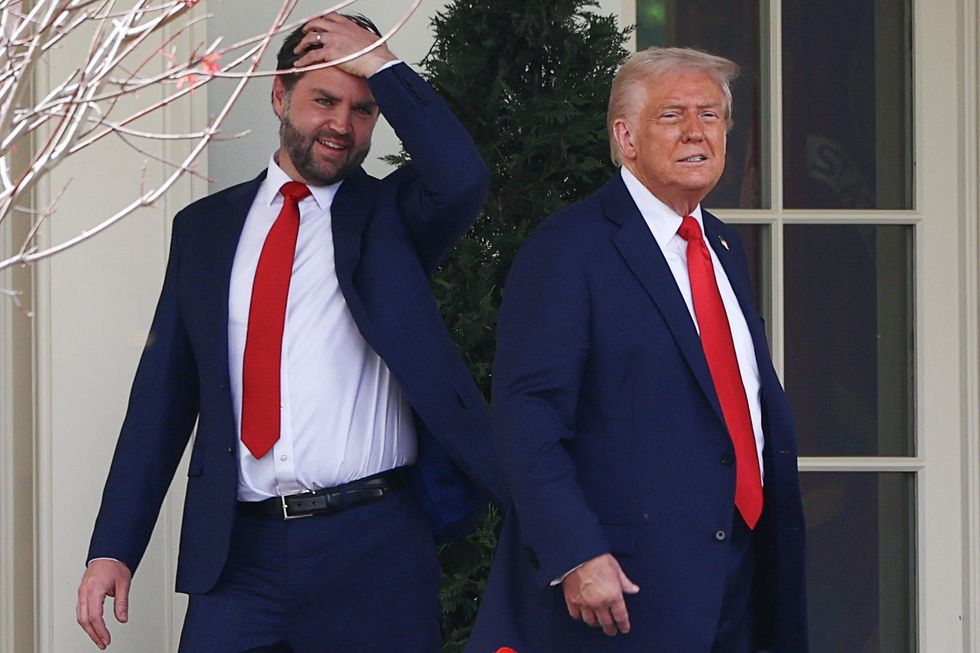 \u200bTrump stands with Vice President JD Vance