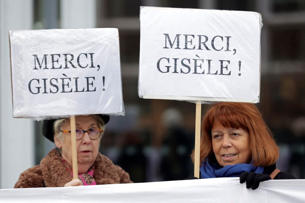 \u200bTwo women hold placards in support of Gisele Pelicot