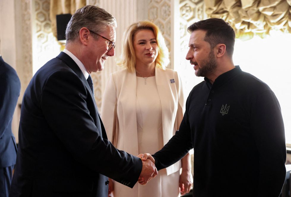 \u200bUkrainian President Zelensky shakes hands with Britain's Prime Minister Keir Starmer