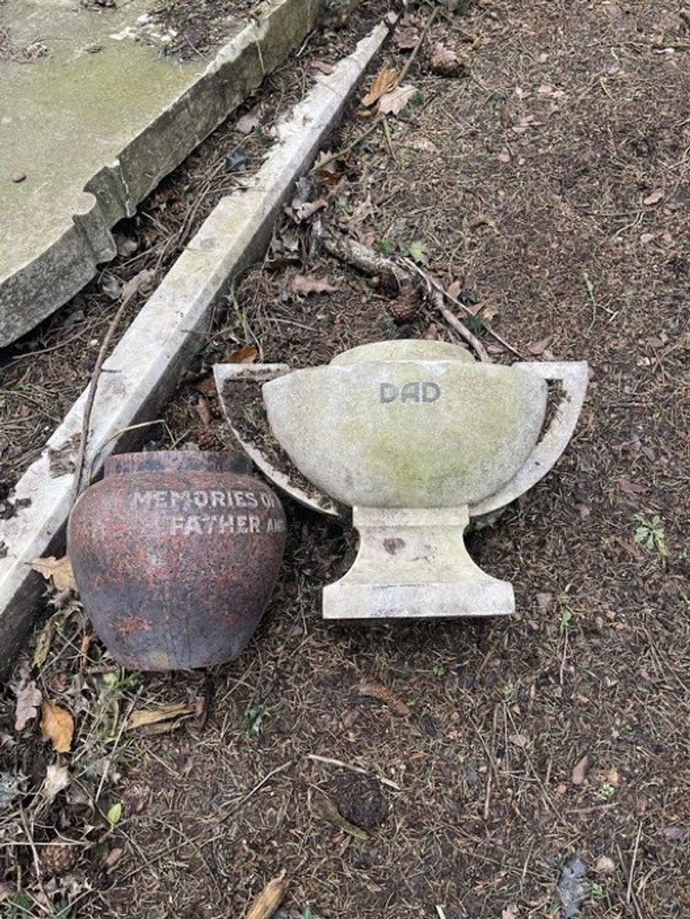 \u200bUrns and memorials knocked over