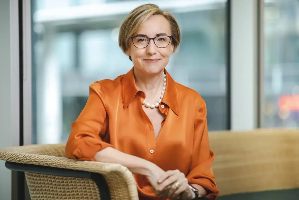 \u200bVodafone Group Chief Executive, Margherita Della Valle pictured in an orange blouse