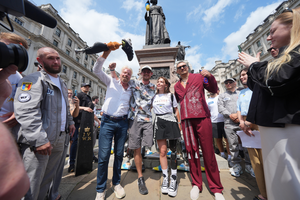 \u200bWorld Heavyweight Champion boxer Oleksandr Usyk and Sir Richard Branson with Eddy Scott and Ruslana Danilkina who both lost limbs in the Ukraine/Russia conflict