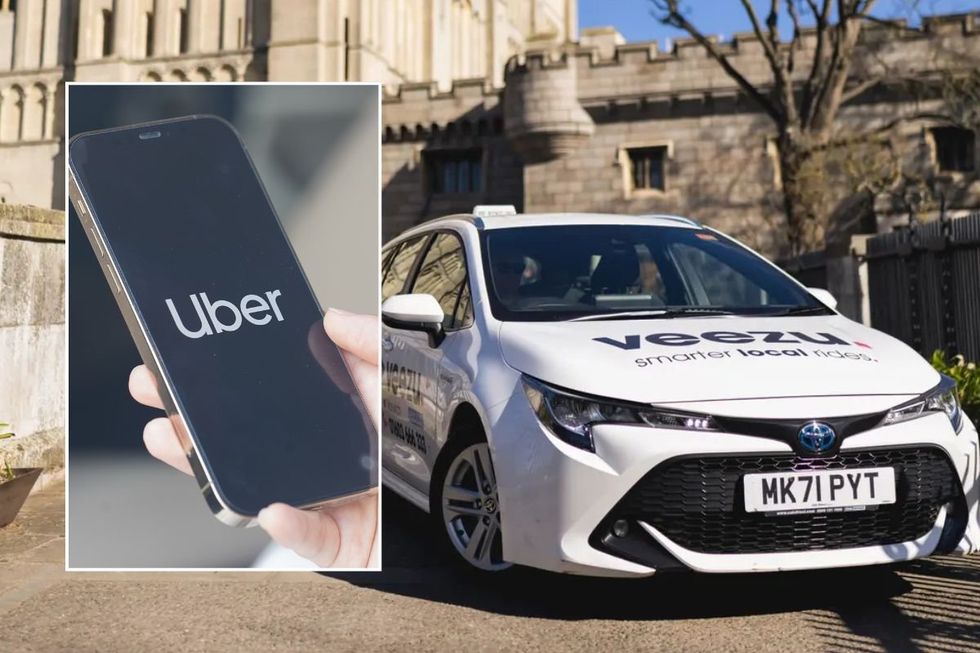 Uber logo and a Veezu car