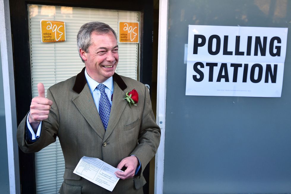 UK Independence Party (UKIP) leader Nigel Farage leaves after casting his vote in Ramsgate in south east England