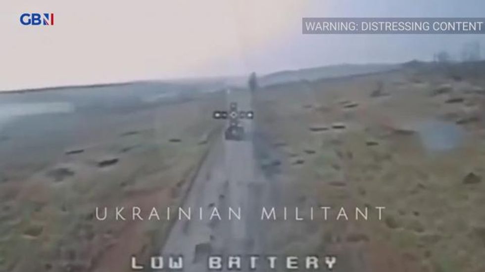 WATCH: Astonishing video shows Ukrainian kamikaze drone DESTROY Russian tank as desperate troops try and shoot it down