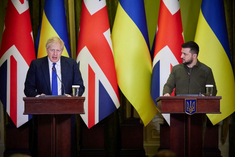 Ukraine's President Volodymyr Zelenskiy and British Prime Minister Boris Johnson attend a news briefing, as Russia's attack on Ukraine continues, in Kyiv.