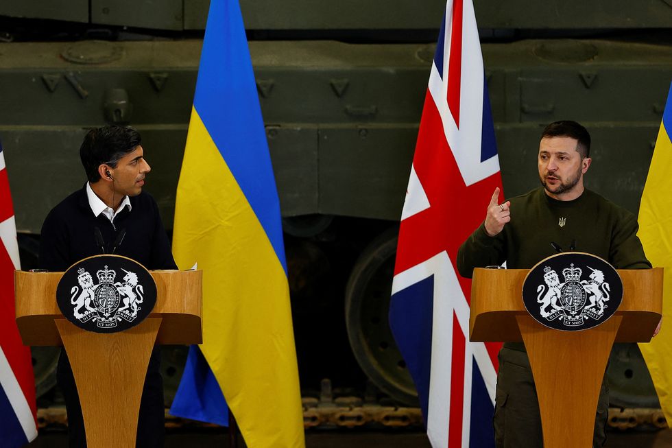 Ukraine's President Volodymyr Zelenskiy and British Prime Minister Rishi Sunak hold a news conference at an army camp, in Dorset county, Britain, February 8, 2023. REUTERS/Peter Nicholls/Pool