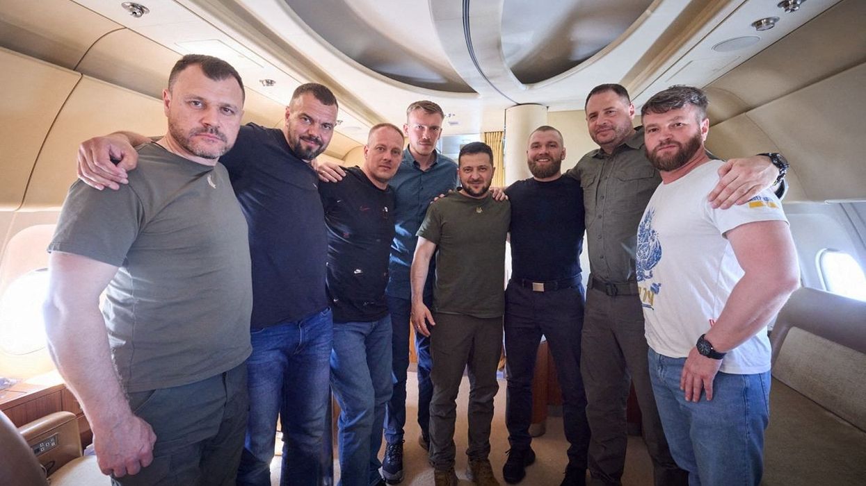 Ukraine's President Volodymyr Zelenskiy, Chief of Staff of Presidential Office Andrew Yermak and Interior Minister Ihor Klymenko pose for a picture with commanders