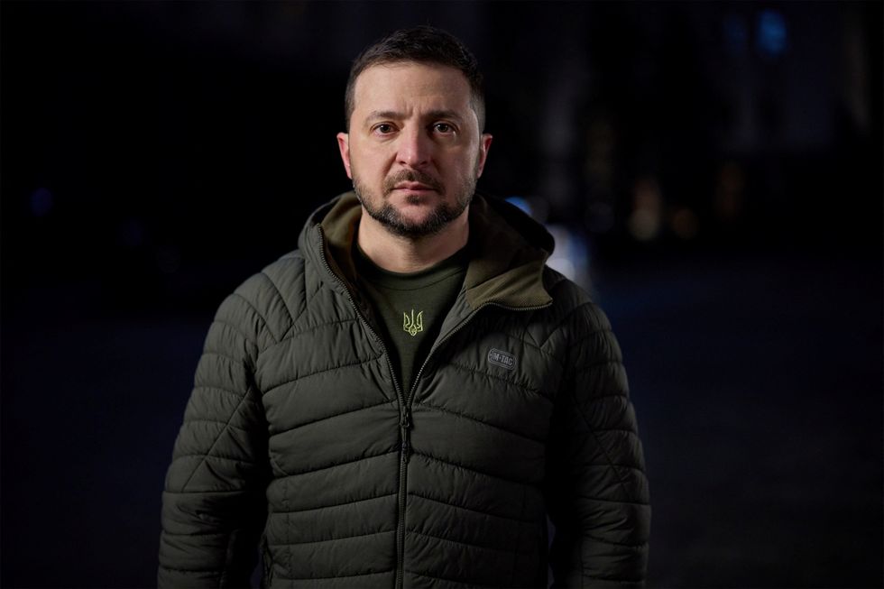 Ukraine's President Volodymyr Zelenskyy addresses Ukrainian people on the New Year eve, amid Russia's attack on Ukraine, in Kyiv, Ukraine, in this handout picture released December 31, 2022