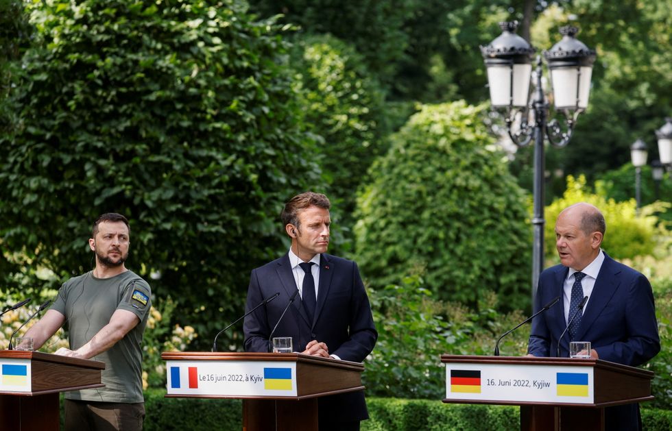 Ukrainian President Volodymyr Zelenskiy, French President Emmanuel Macron and German Chancellor Olaf Scholz attend a joint news conference, as Russia's attack on Ukraine continues, in Kyiv, Ukraine June 16, 2022. REUTERS/Valentyn Ogirenko