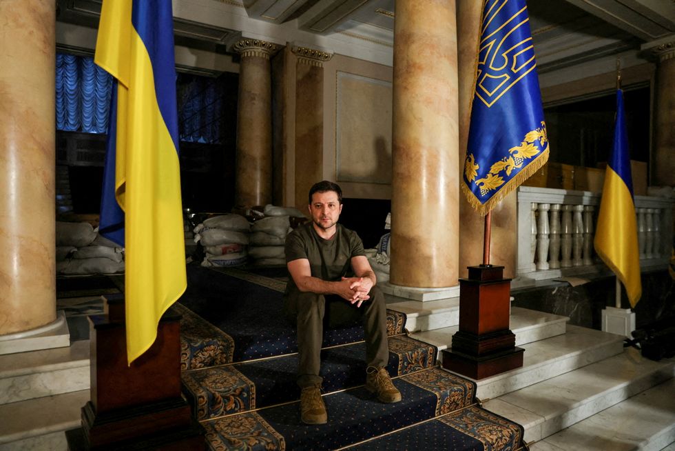 Ukrainian President Volodymyr Zelenskiy poses after an interview with Reuters in Kyiv, Ukraine