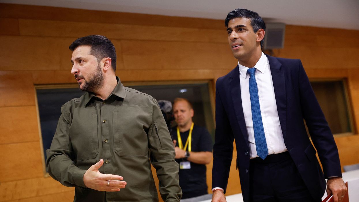 Ukrainian President Volodymyr Zelensky greets Prime Minister Rishi Sunak ahead of their bilateral meeting during the European Political Community summit in Granada, Spain