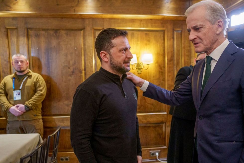 Ukrainian President Volodymyr Zelensky stands with Norway's Prime Minister Jonas Gahr St\u00f8re \u200b