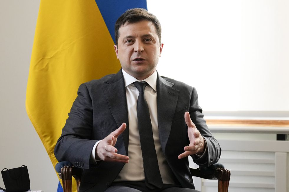 Ukrainian President Volodymyr Zelenskyy attends a meeting with Prime Minister Boris Johnson at the Munich Security Conference in Germany.