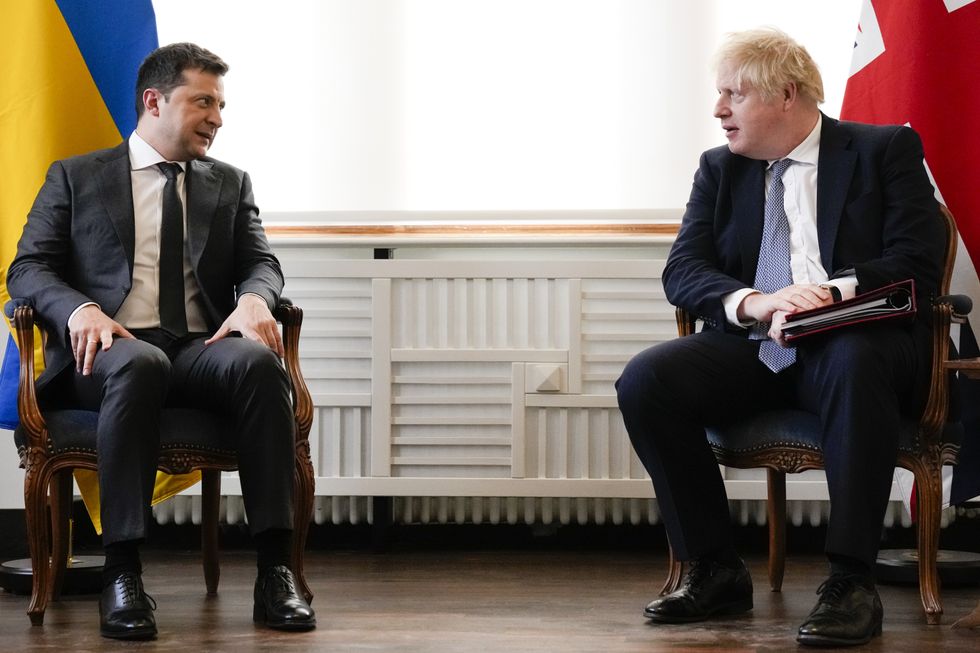 Ukrainian President Volodymyr Zelenskyy attends a meeting with Prime Minister Boris Johnson at the Munich Security Conference in Germany where the Prime Minister is meeting with world leaders to discuss tensions in eastern Europe. Picture date: Saturday February 19, 2022.