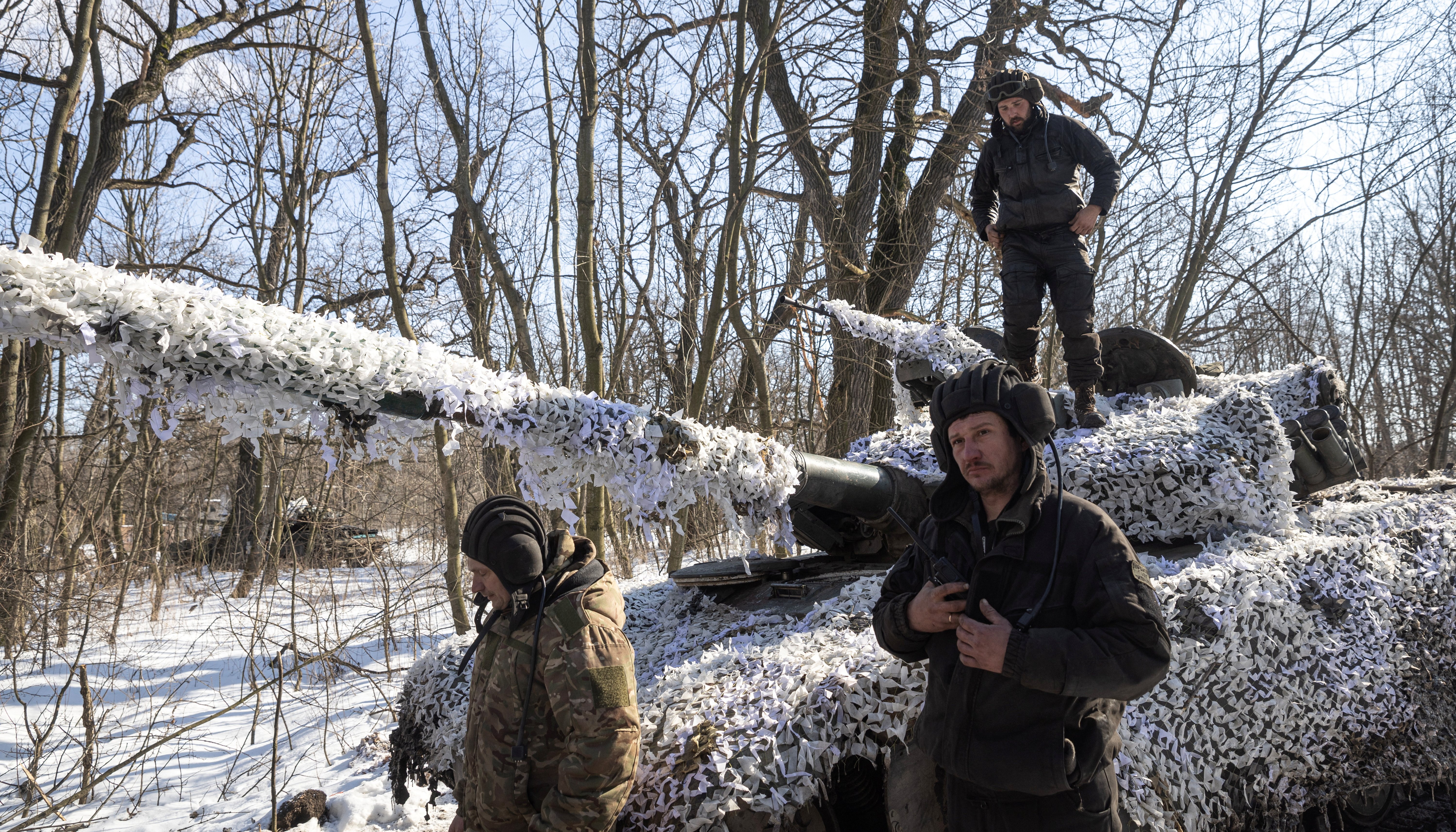 Ukrainian servicemen of the 17th Independent Tanks Brigade are seen in front of a T-64 tank, as Russia's attack on Ukraine continues, near the frontline town of Bakhmut, Donetsk region, Ukraine February 23, 2023. REUTERS/Marko Djurica\u2028\u2028