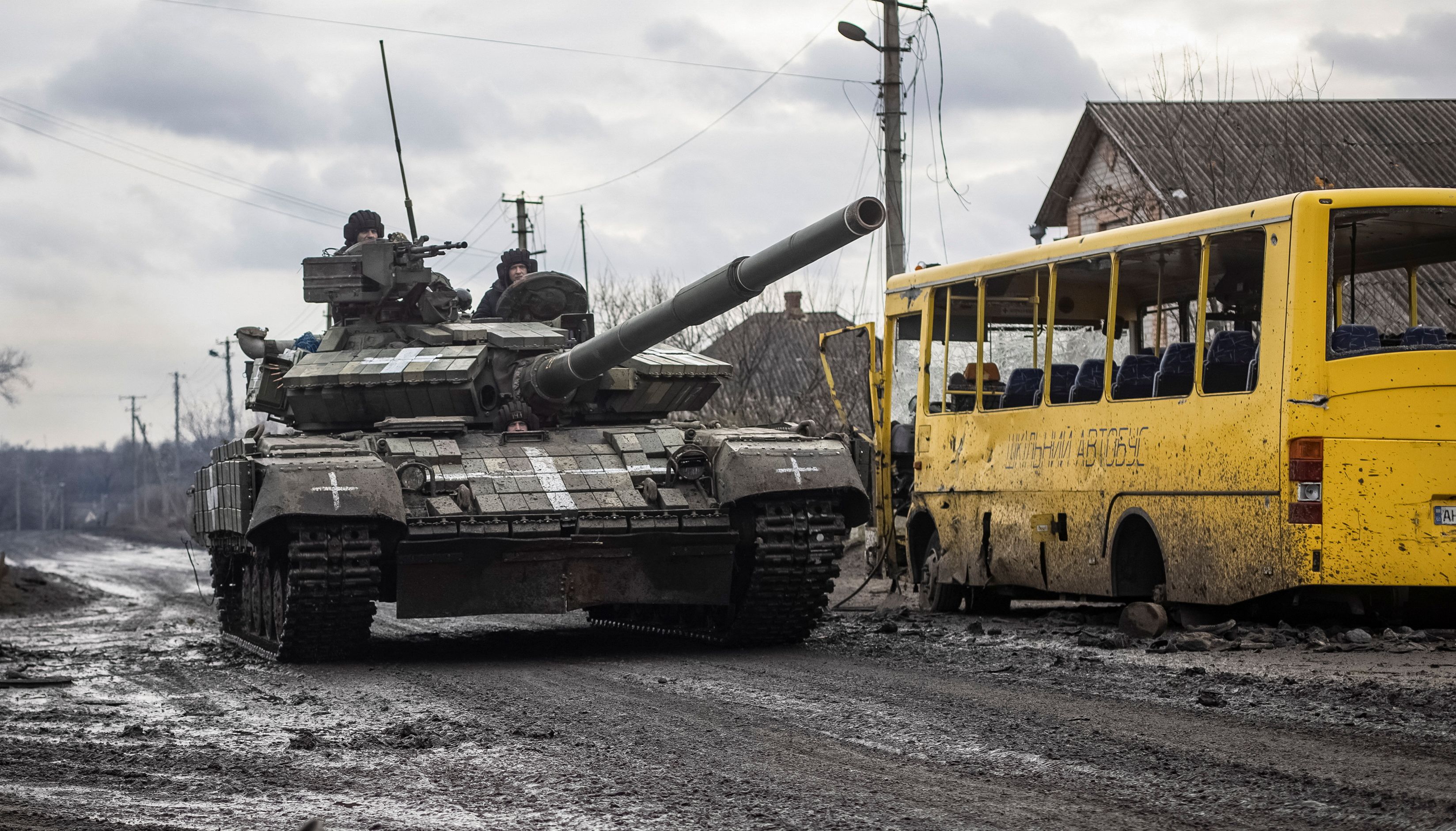 Ukrainian servicemen ride a tank, as Russia's attack on Ukraine continues, in the village of Torske, Donetsk region, Ukraine December 30, 2022.
