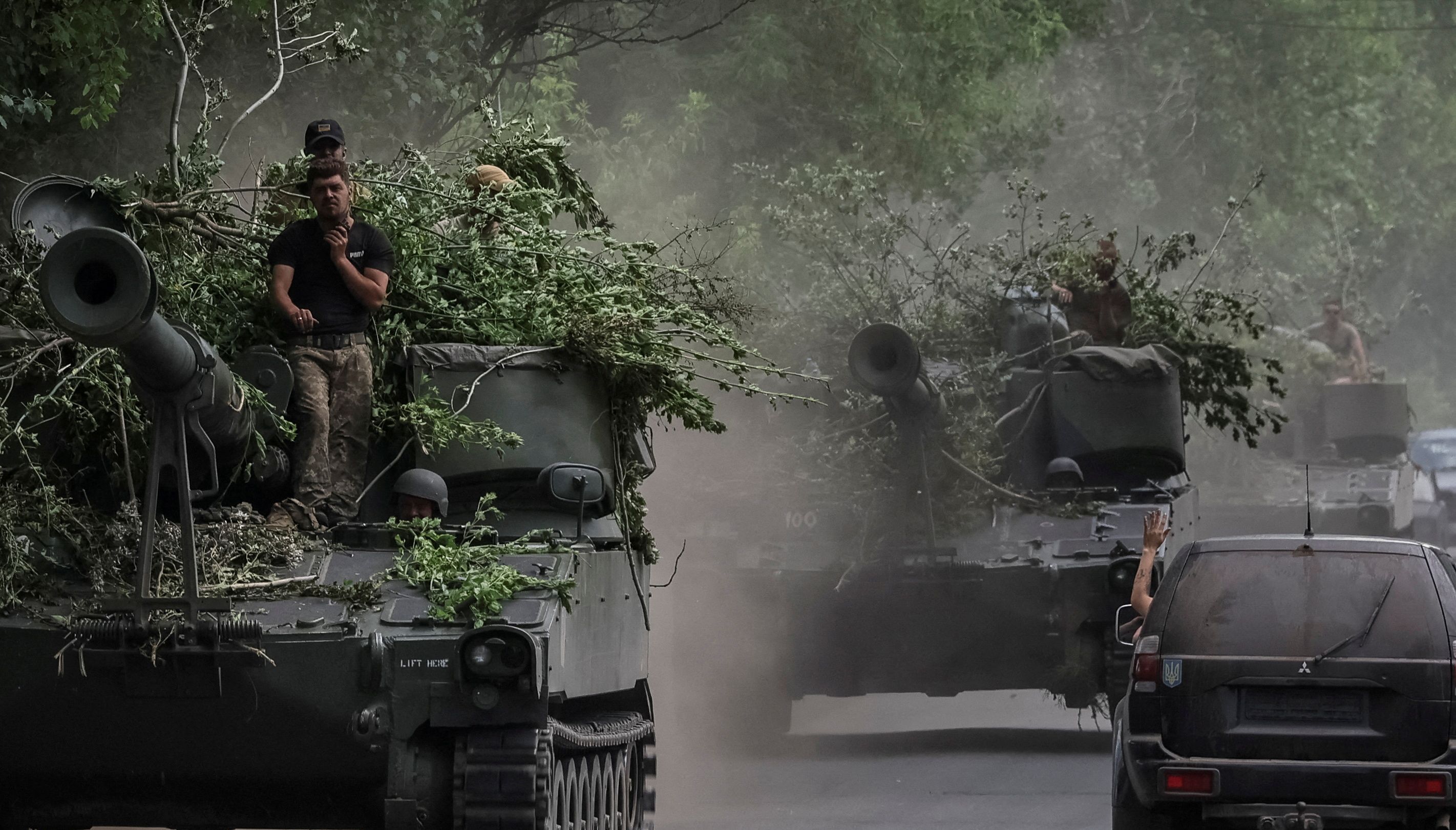 Ukrainian servicemen ride American 155 mm turreted self-propelled howitzers M109, amid Russia's attack on Ukraine, in Donetsk region, Ukraine.