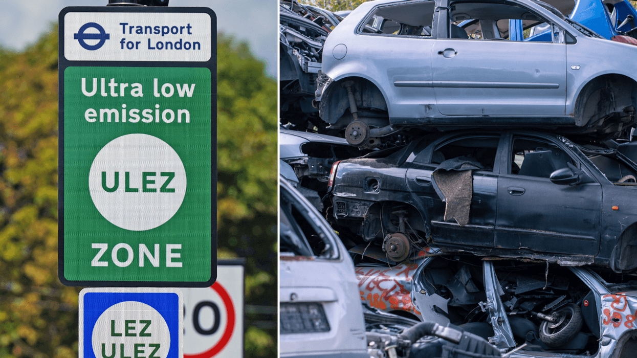 Ulez sign and a stack of scrapped vehicles